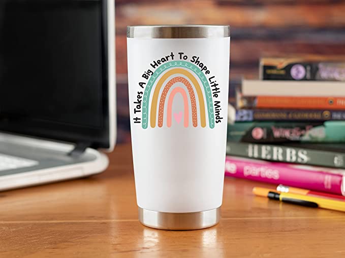 Teacher Heart Tumbler Tumbler on teacher desk that says It Takes a Big Heart to Shape Little Minds, as an example of teacher valentine gifts