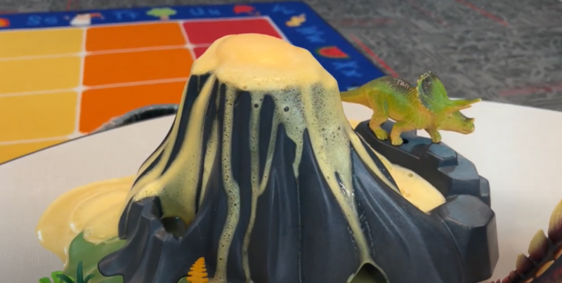 Volcano Step 8 A plastic volcano is seen erupting.