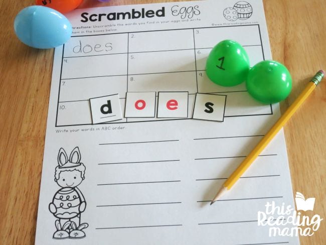 Easter Egg Activities This Reading Mama Scrambled Eggs printable worksheet with plastic eggs and small cards spelling out the word