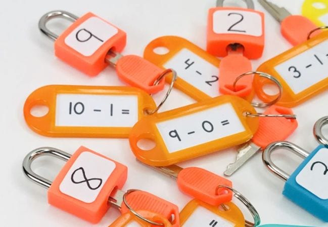 sutraction-lock-and-key Colorful plastic locks and keys with subtraction problems and solutions written on them