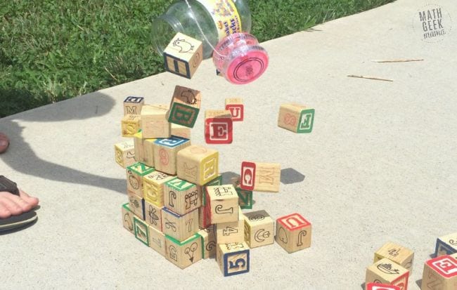 wrecking-ball-math A block tower is knocked over by a yoyo on a string