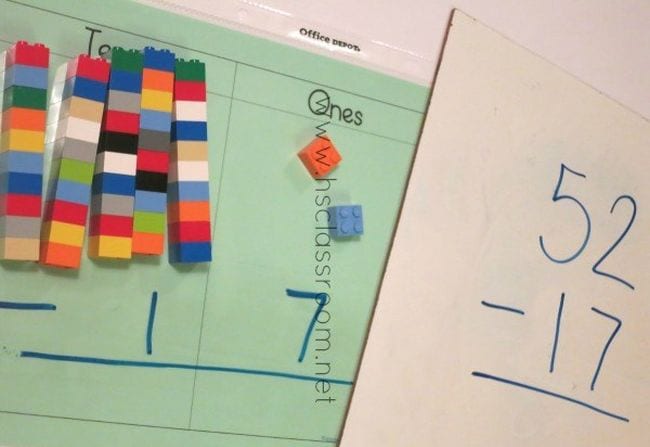 double-digit-lego-subtraction Stacks of legos on top of a double digit subtraction worksheet