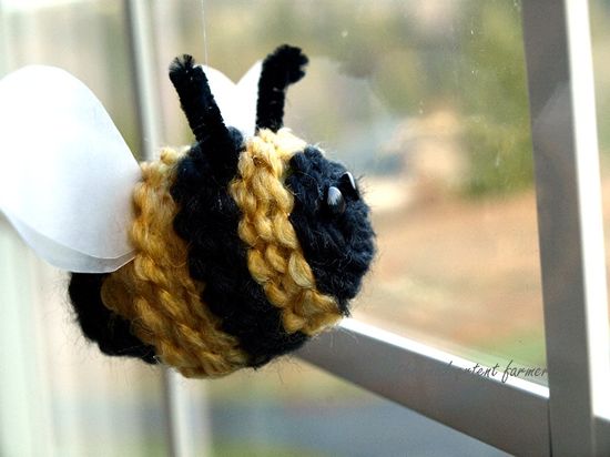 bumble-bee-egg plastic egg covered in yarn to look like a bee