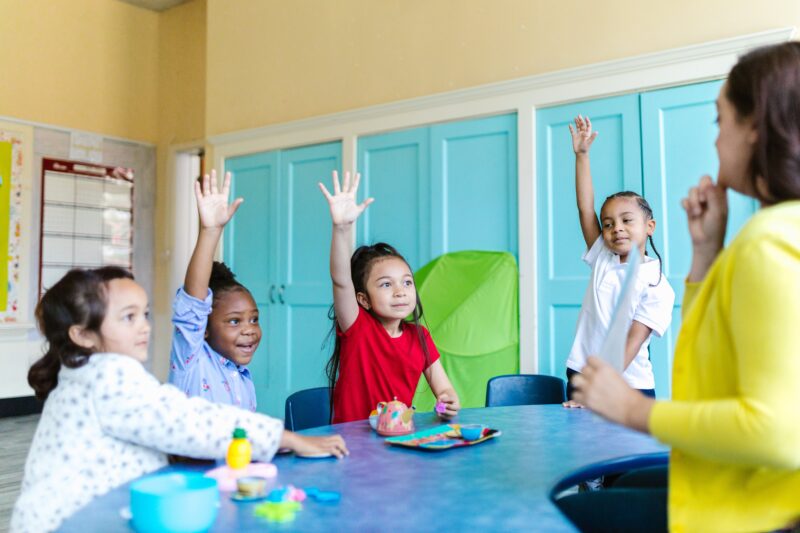 Children at School Table Children sitting at a school table