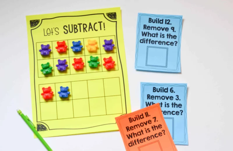 subtraction-counting-bears A yellow gridded worksheet with colorful plastic bear counters