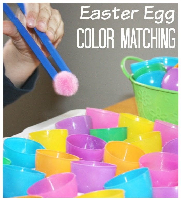 easter_egg_color_matching Child using plastic tweezers to sort colored pom poms into matching Easter egg halves
