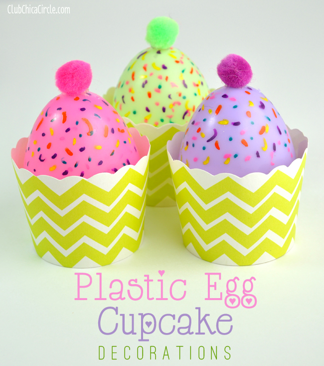 eastereggcupcakes the top half of plastic eggs have been transformed into toy cupcakes. Sprinkles have been painted on them and they have pom poms for cherries. They are in cupcake wrappers.