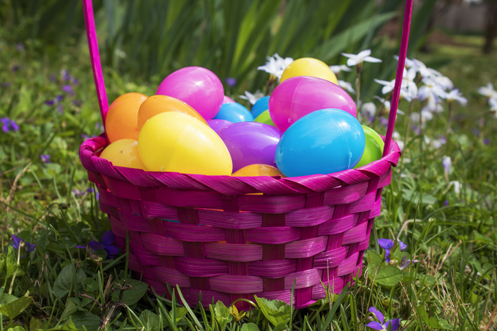 Easter Eggs A purple basket filled with colorful plastic eggs is shown.