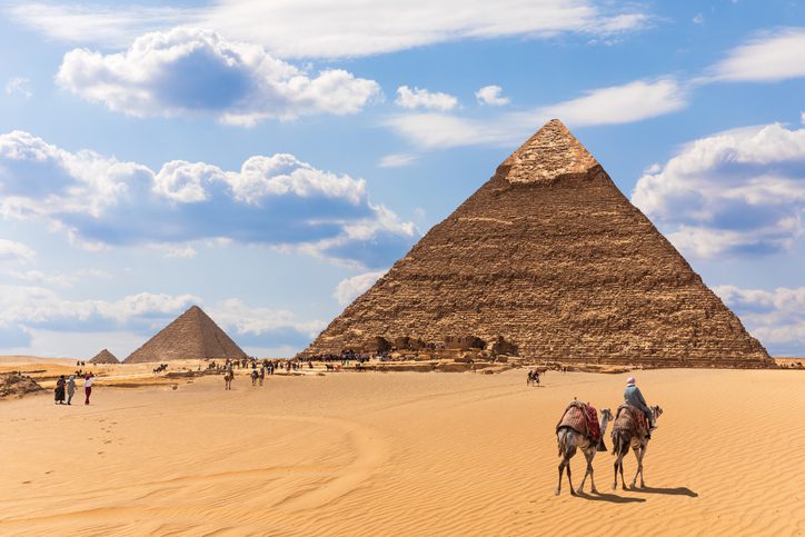 The Pyramids and bedouins in the desert of Giza, Egypt The Pyramids and bedouins in the desert of Giza, Egypt.