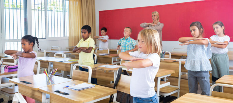 classroom-exercise Kids doing stretches in the classroom
