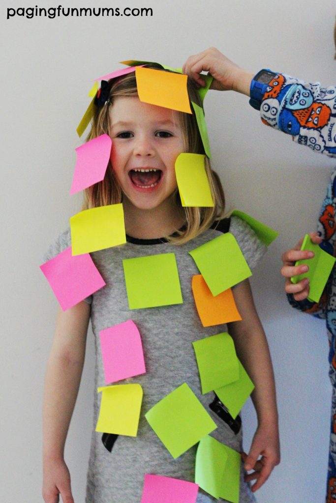 Post It Notes A little girl is covered in post it notes in this example of minute to win it games.
