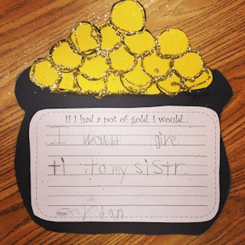 pot of gold a pot of gold and coins made from black and yellow construction paper with a child's writing sample attached to it