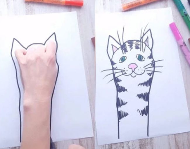 Kindergarten Art Projects: Hand Drawings Tracing of a hand turned into a cat