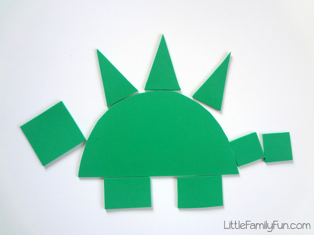 Kindergarten Art: Dino A green dinosaur is constructed from various shapes.