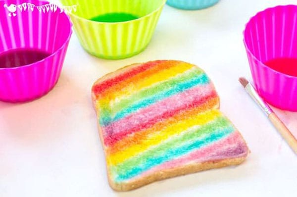 Painted Bread A piece of bread is painted with rainbow stripes.