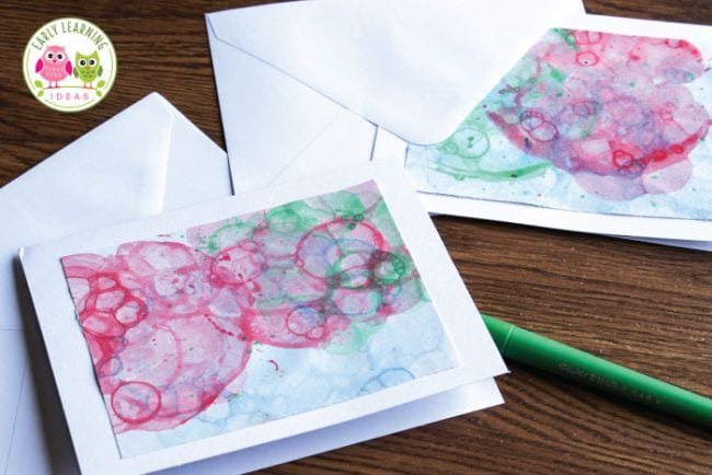 Kindergarten Art Early Learning Ideas Paintings that look like bubbles are shown.