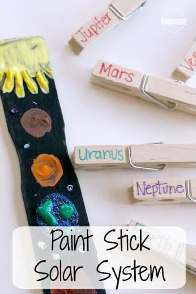 paintsticksolarsystem A wooden paint stick has been painted black with different colored planets painted on it. Clothespins are shown beside it with the names of planets on them (solar system projects)