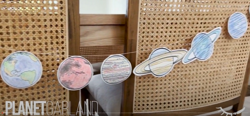 Planet Garland Screenshot of video on how to make planet garland.