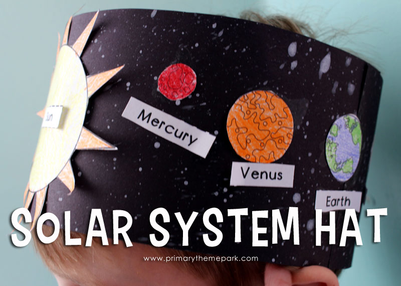 solarsystemhat The top part of a child's head is shown wearing a homemade headband that has the sun and planets on it (solar system projects)