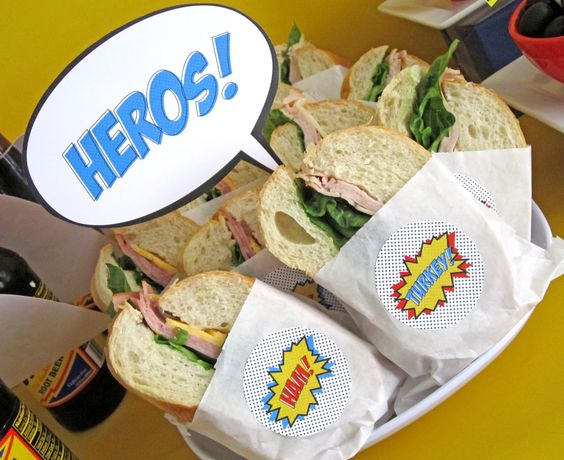 hero-sandwiches hero sandwiches wrapped in paper with a note that says heros!