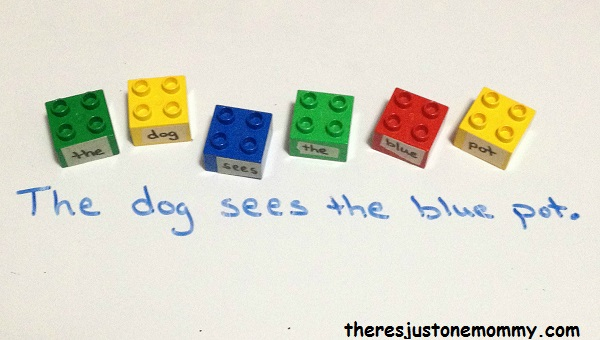 lego-sentence Colorful lego blocks with a word taped to each laid out to form a sentence as an example of grammar games