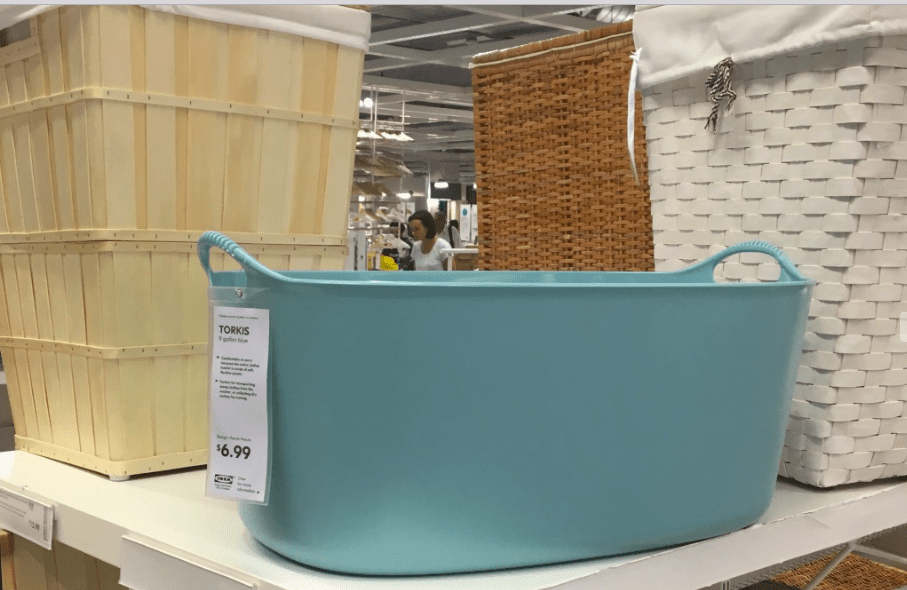 A blue rubber basket is shown. 