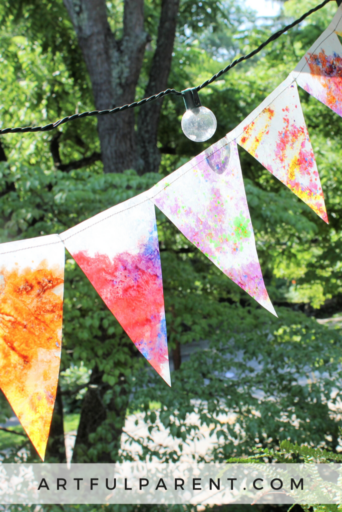 stained-glass-bunting A colorful banner of triangular shaped, multicolor flags as an example of summer crafts for kids