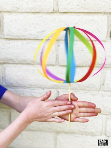 paper-twirligig A whirligig made from colorful paper strips and a stick