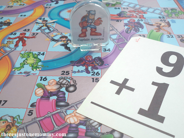 chutes-and-ladders math flash card on a board game