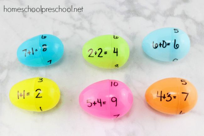 egg-math-fact-game plastic eggs with math facts written on them for a math facts game