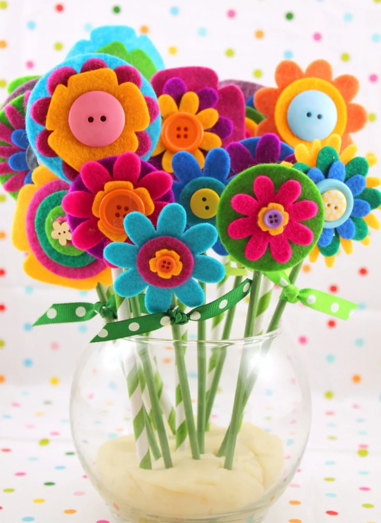 felt-flowers Colorful flowers made from felt peek out of a vase