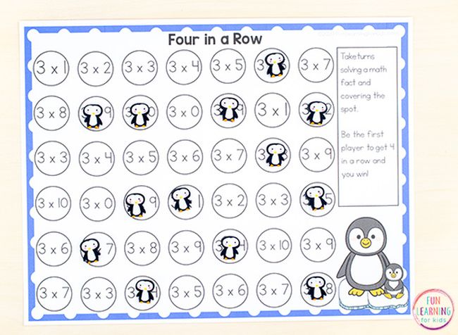 four-in-a-row game board with math problems and penguin pictures covering some problems for a math fact game