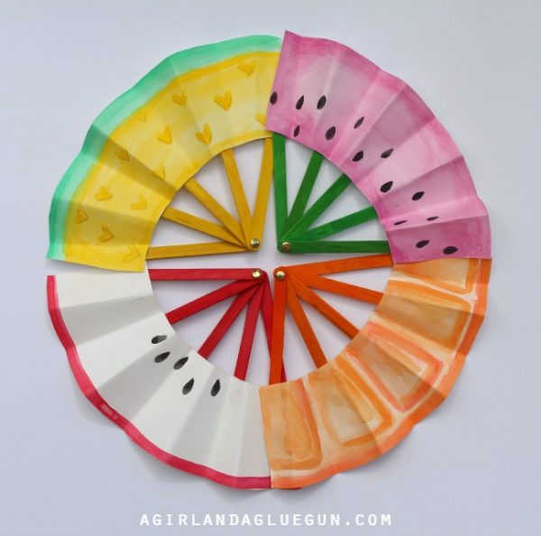 fruit-fans Colorful fans made from craft sticks and decorated paper form a circle