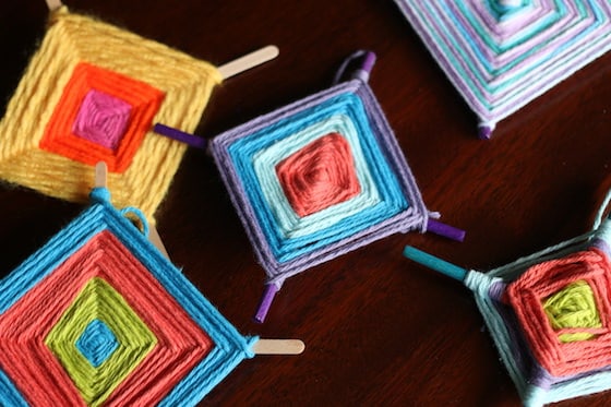 gods-eyes Colorful God's Eye crafts laid out on a table