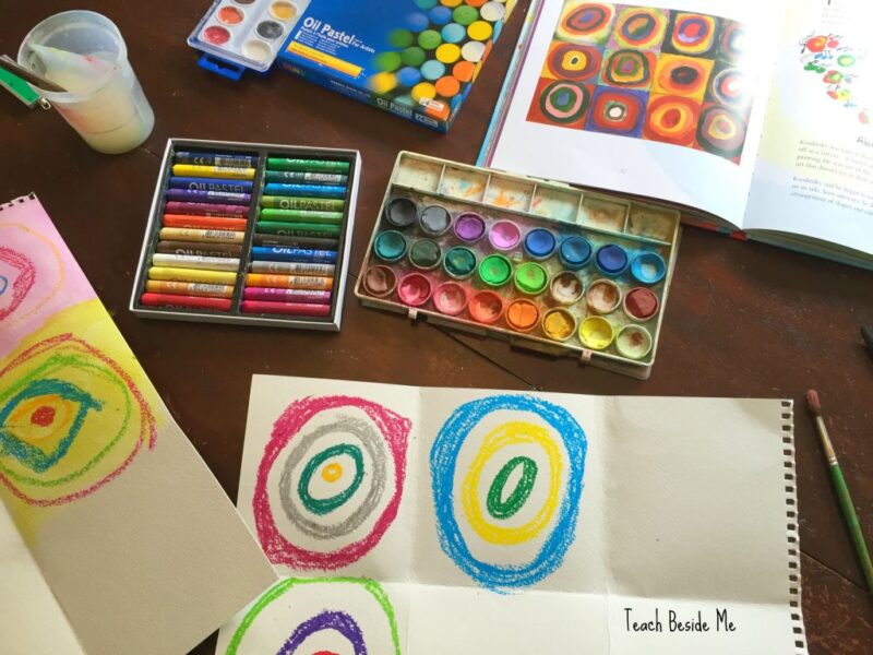 kids-kandinsky Art Supplies flank a drawing in the circle style of artist Kandinsky