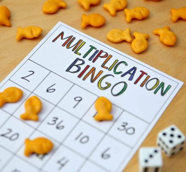 math-bingo fish crackers on a math bingo board for a math facts game