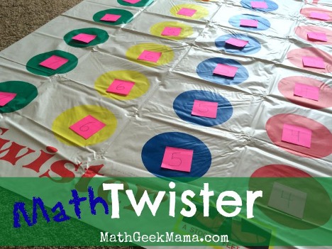 math-twister twister mat with sticky notes with math problems on them for a math facts game