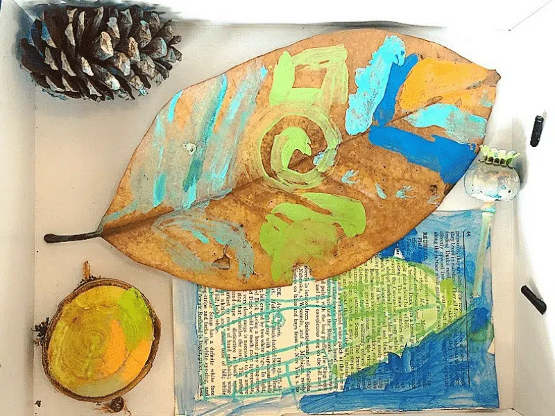 nature-diorama A beautiful collage is made from natural found objects as an example of summer crafts for kids