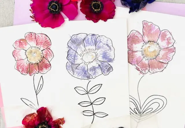 pressed-flowers Three drawings of flowers made from pressed flowers and ink outlines as an example of summer crafts for kids