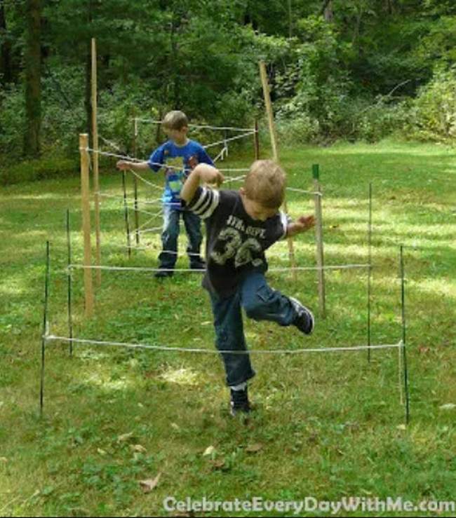 DIY Obstacle Courses for Kids: Trains Children working their way over and under a series of ropes in an obstacle course