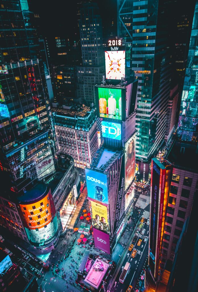 New York Times Square with buildings covered in lights and ads