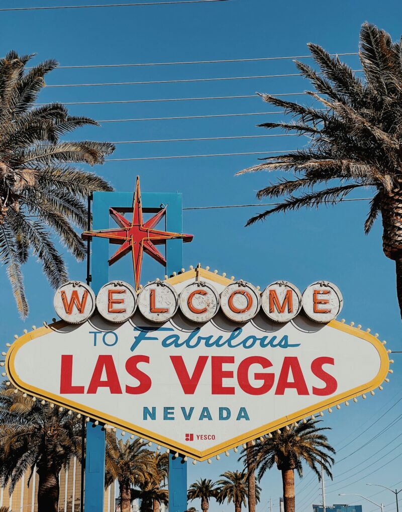 Sign that says Welcome to Fabulous Las Vegas Nevada with blue sky in background