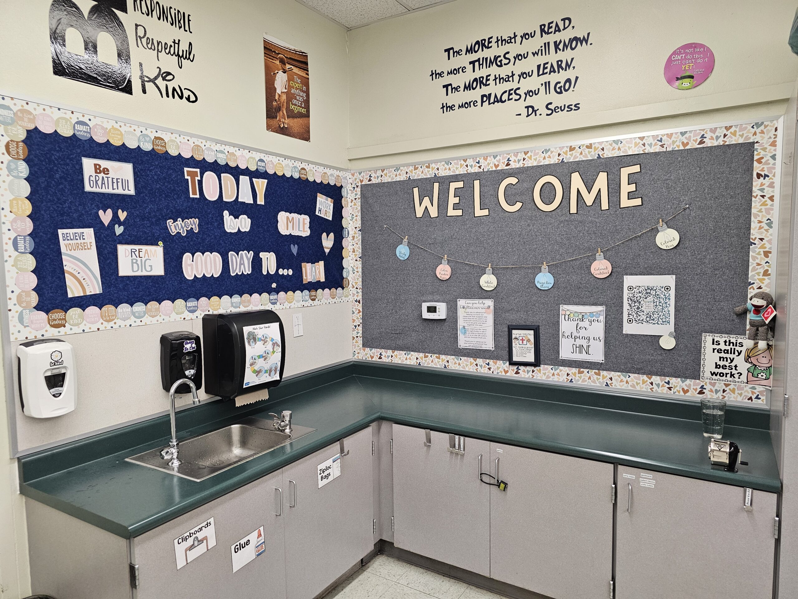Positive-Message Positive messages are seen on two bulletin boards over a classroom sink.