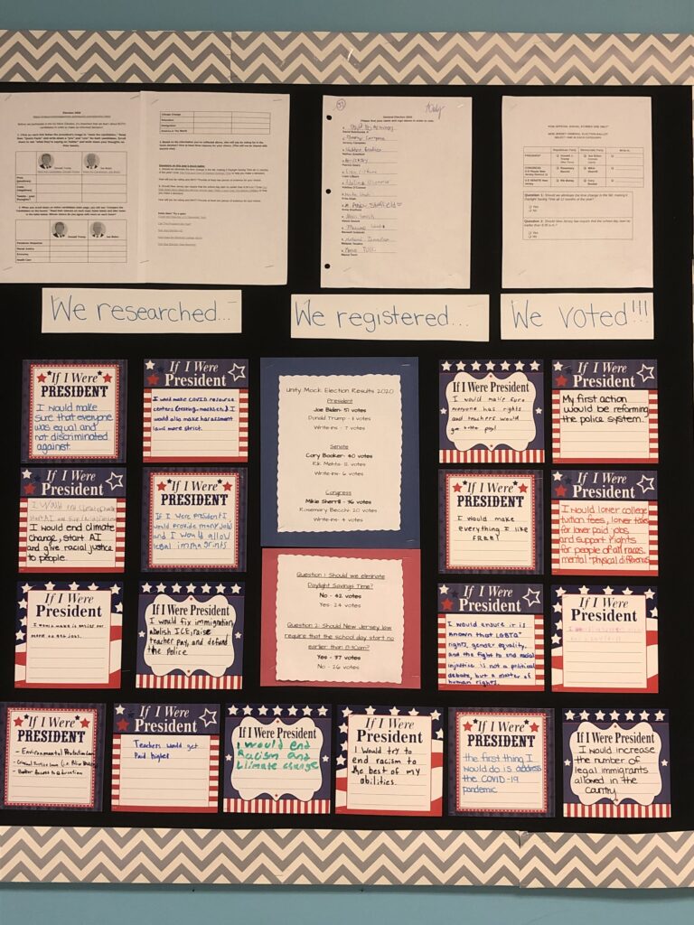 President-Bulletin-Lindsey-Daly A bulletin board says We researched, we registered, we voted. It has a lot of papers, etc. attached.