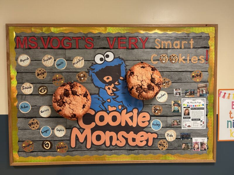 smart-cookie-Rhonda-Vogt A bulletin board has cookie monster in the middle. there are cookies throughout with students names on it.