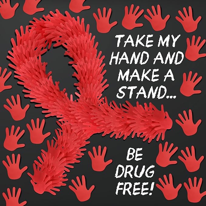 Red Ribbon Week Bulletin Board Bulletin board shows a ribbon made of red hand-shaped sticky notes. Text reads Take My Hand and Make a Stand ... Be Drug Free!