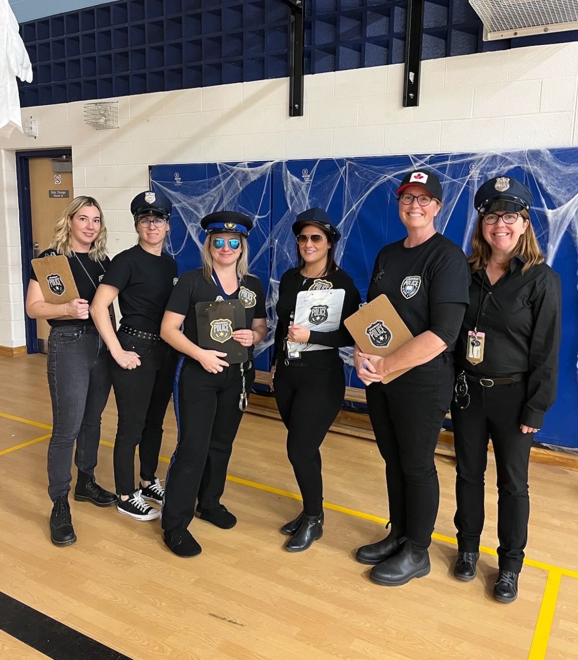 Halloween Costumes: Grammar Police Group of teachers dressed in police uniforms as the Grammar Police