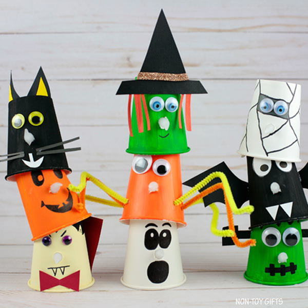 paper-cup-halloween Paper cups colorfully decorated as pumpkins, spiders, witches, ghosts and more as an example of halloween crafts for kids