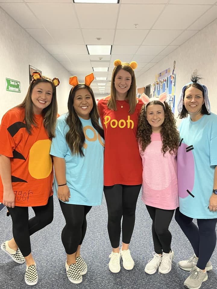 Halloween Costumes: Winnie the Pooh Teachers dressed as Winnie the Pooh characters for Halloween