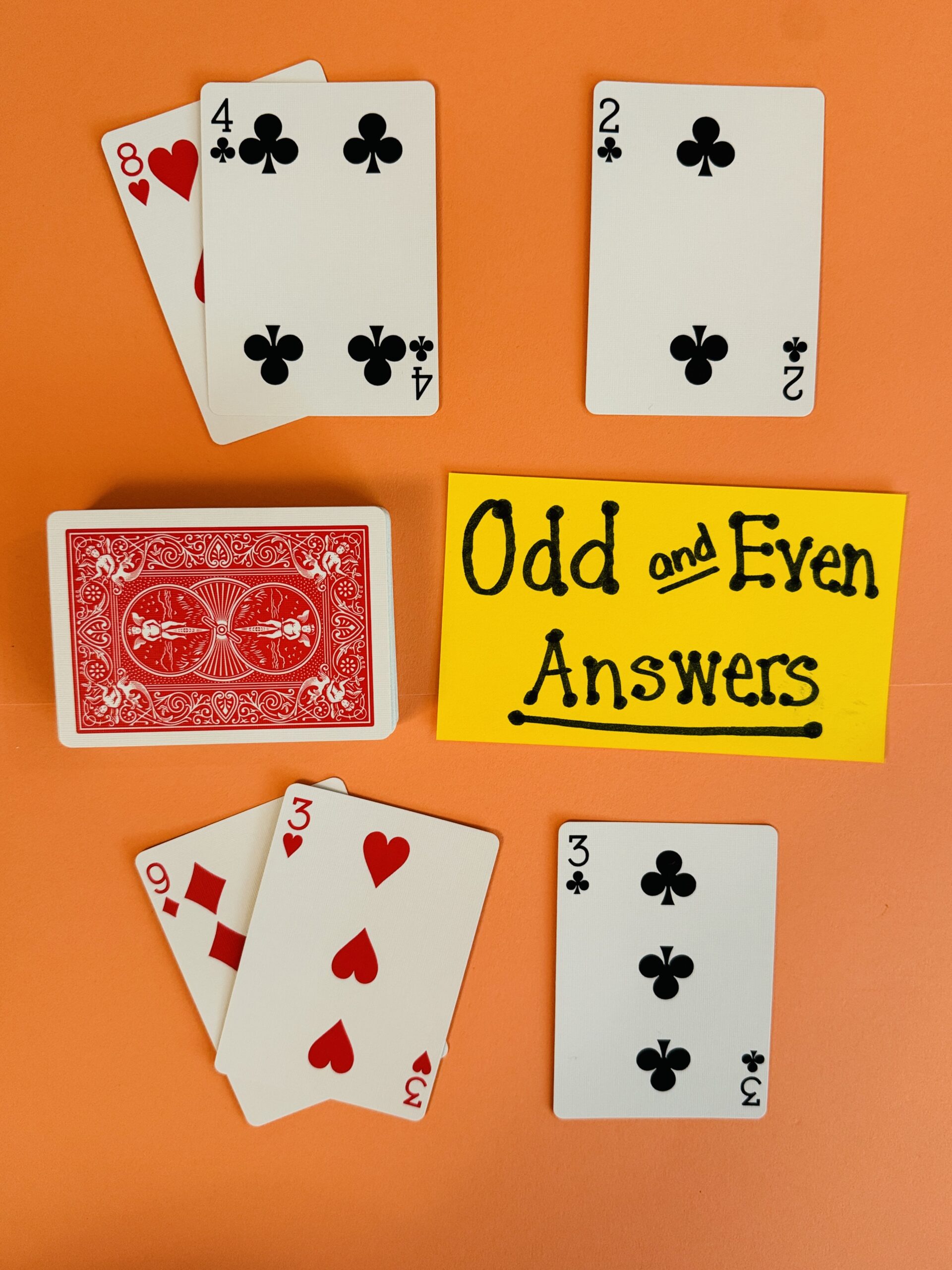 OddAndEvenAnswers2 Deck of cards and a flashcard with the words Odd and Even Answers